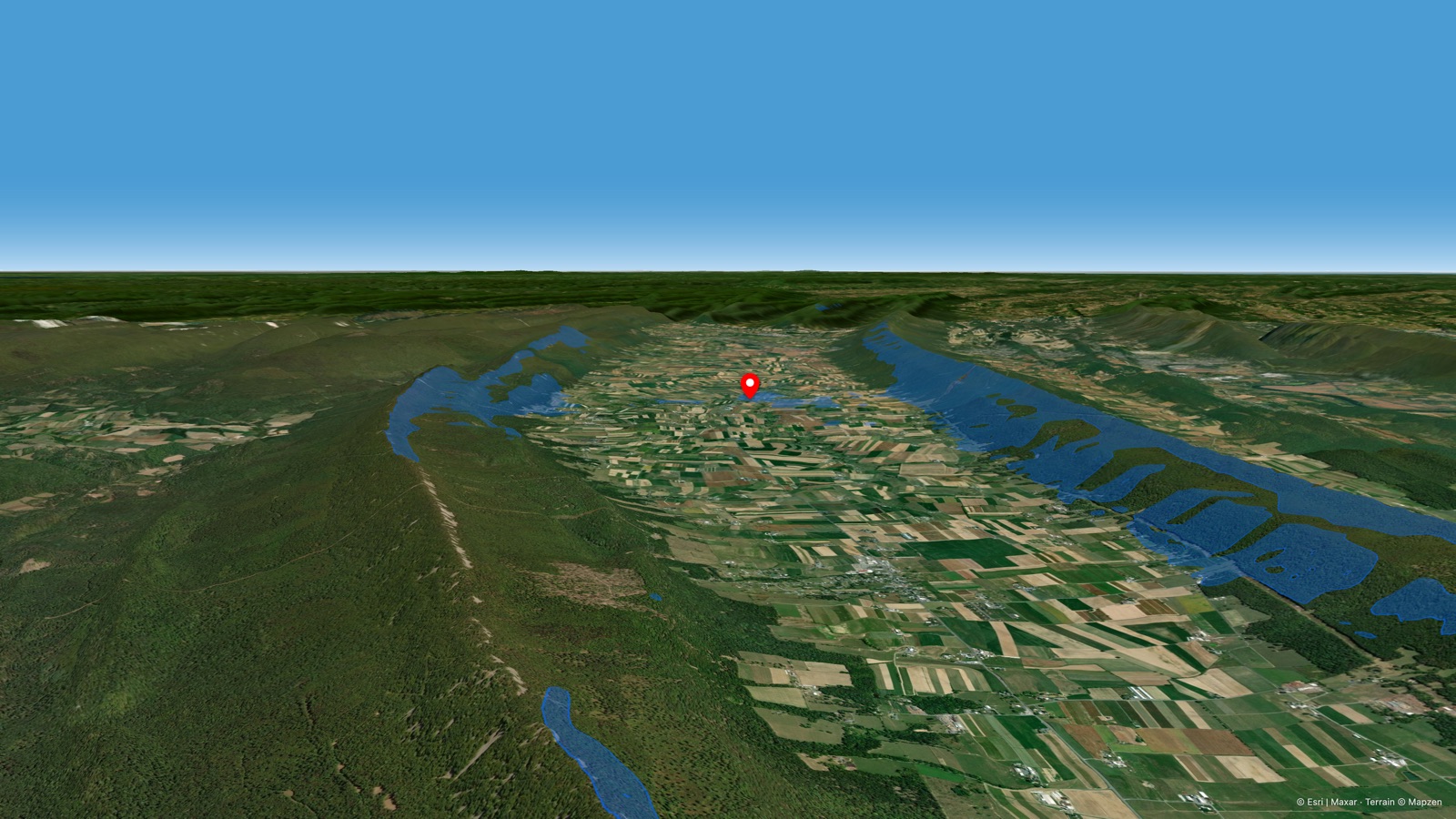 Vista 3D desde la perspectiva del piloto sobre las crestas paralelas del Big Valley desde el punto de despegue, renderizada en el modo Studio de la app