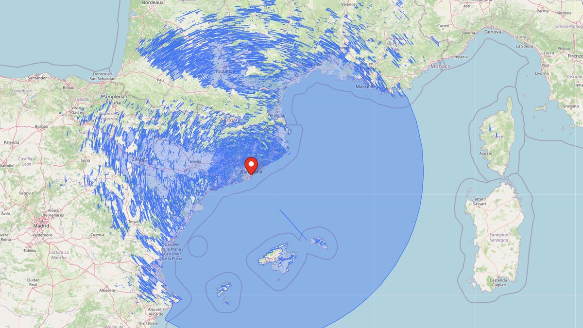 Cuenca visual 360° de UpToWhere calculada desde 11.000 m sobre Barcelona: un enorme disco de área visible sobre el Mediterráneo que alcanza Córcega, con sombras del terreno por España y Francia