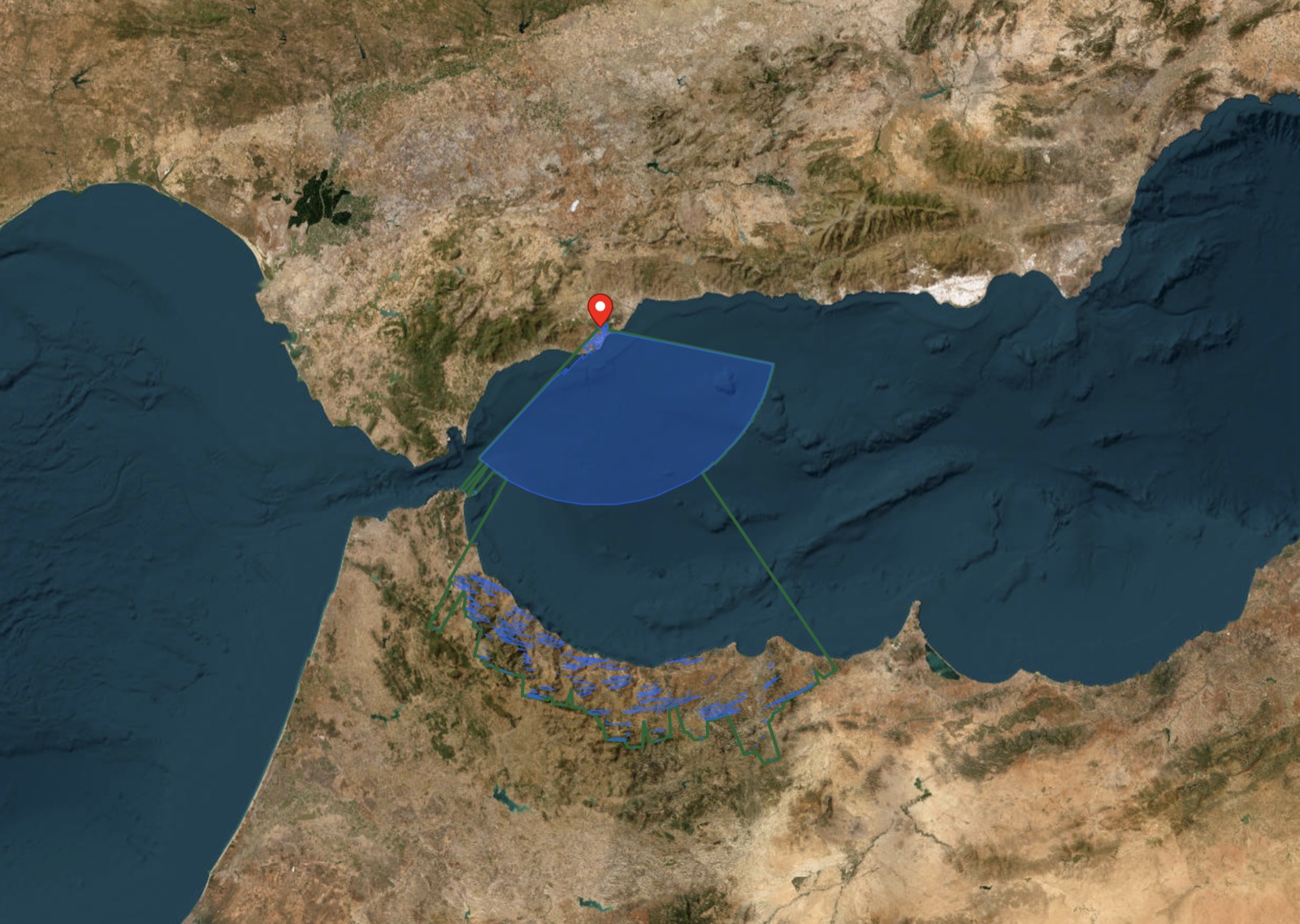 Satellite view of the same viewshed zoomed out, showing the visible sea fan ending at the horizon and Morocco's Rif Mountains visible beyond it
